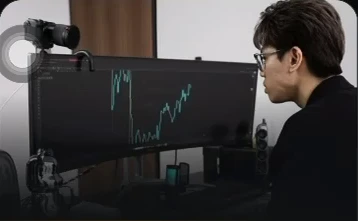 Trader reviewing gold market charts